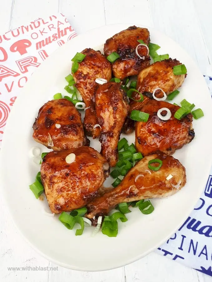 Orange Honey Ginger Chicken is sticky delicious ! Sweet, salty and perfect for dinner, as an appetizer or a game day treat