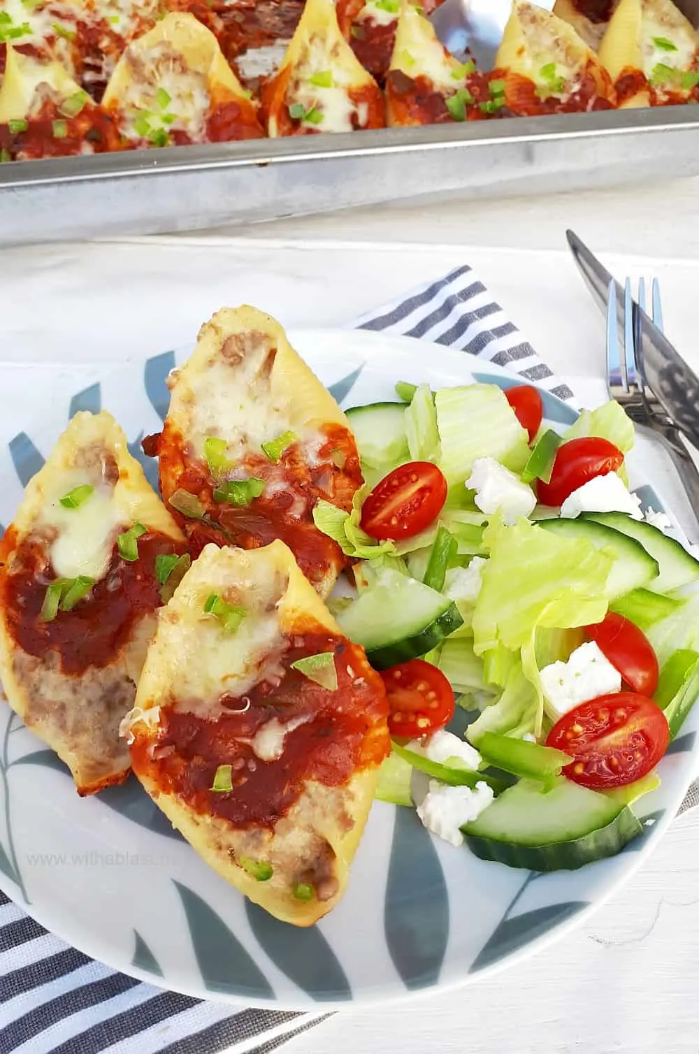 Three Cheese Stuffed Pasta Shells are filled not only with three cheeses, but ground beef as well, making this the ideal light dinner or serve as an appetizer.