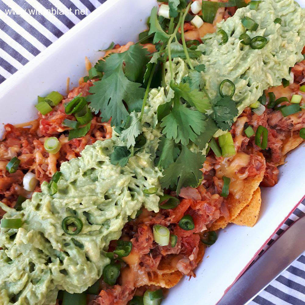 Quick Tuna melt Nachos is a cheesy, tomato rich, quick and easy dish to be served as an appetizer, snack and perfect as a light dinner too