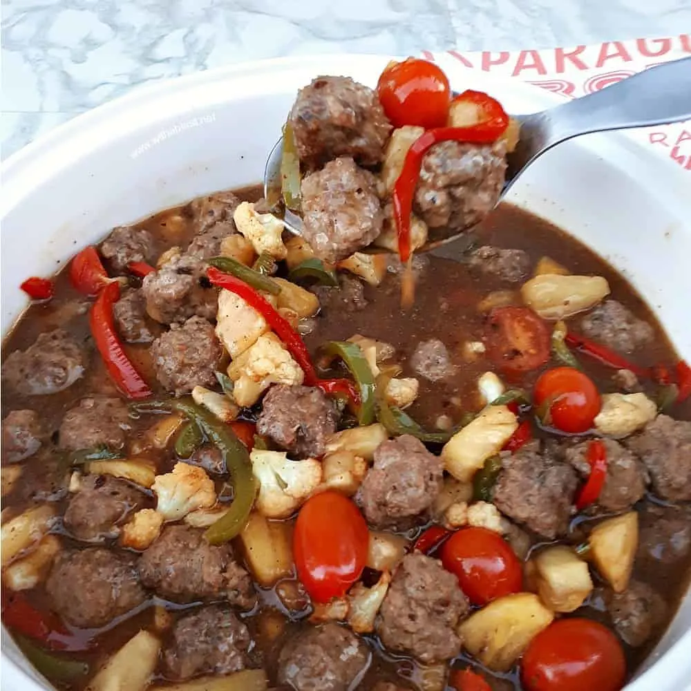 Sweet and Sour Meatball Stir-Fry with loads of sauce (or not!) is the perfect week night dinner - meatballs, vegetables and sauce made in a wok or large skillet.