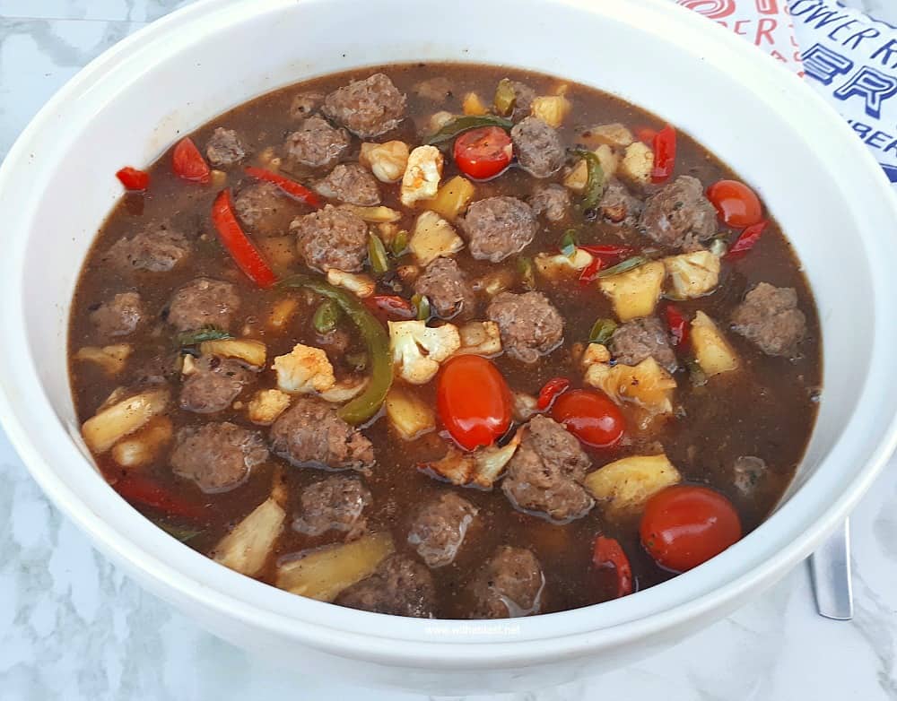 Sweet and Sour Meatball Stir-Fry with loads of sauce (or not!) is the perfect week night dinner - meatballs, vegetables and sauce made in a wok or large skillet.