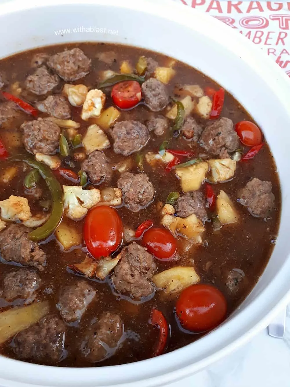 Sweet and Sour Meatball Stir-Fry with loads of sauce (or not!) is the perfect week night dinner - meatballs, vegetables and sauce made in a wok or large skillet.