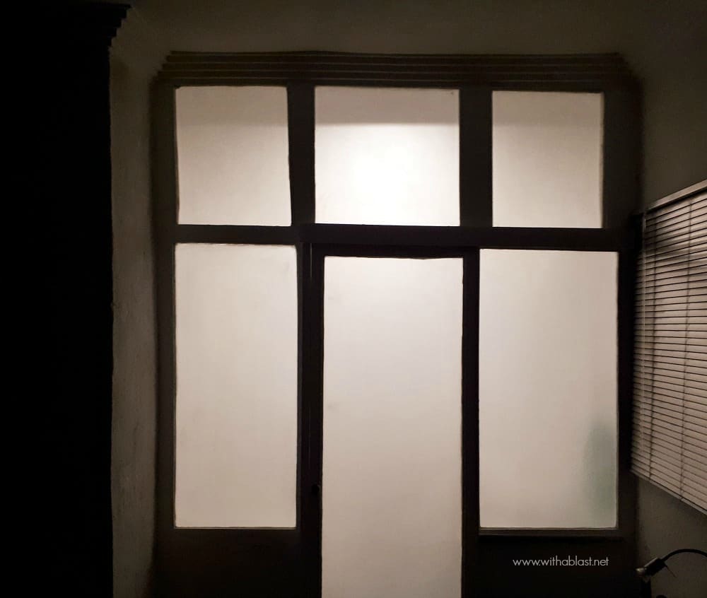 Bathroom Makeover - sand blasted glass wall panels and door from bedroom side in dark