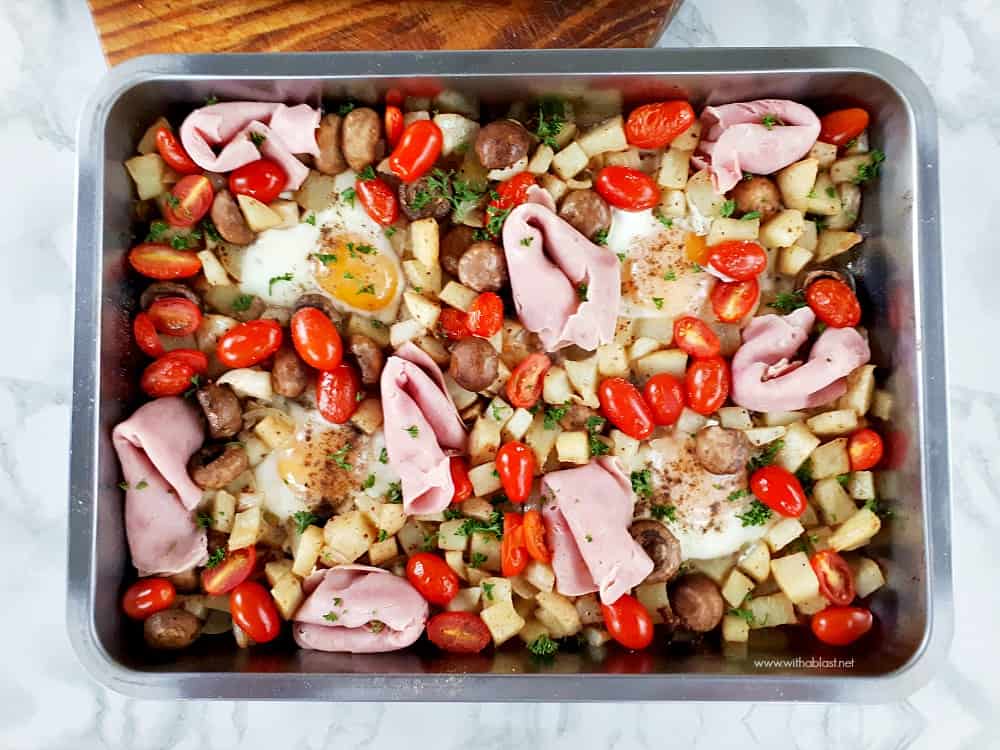 Simple, everyday ingredients make this Ham Eggs and Potato Tray Bake a winner every time - Make 2 trays and feed a crowd during the holidays !
