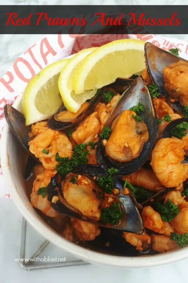 Red Prawns and Mussels are slightly spicy and nestled in a creamy paprika tomato sauce - so quick and easy to serve for dinner or as an appetizer #RedPrawnRecipes #TomatoSaucePrawns #ComfortFood #SeafoodRecipes #EasySeafoodReipes #MusselsRecipe #DinnerRecipes #EasyAppetizerRecipes #ValentinesDayRecipes