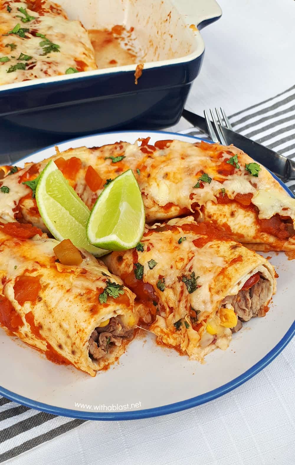 Perfectly marinated Tequila Lime Steak Enchiladas are loaded with steak, a delicious salsa, cheese and topped with chunky salsa sauce and more cheese !