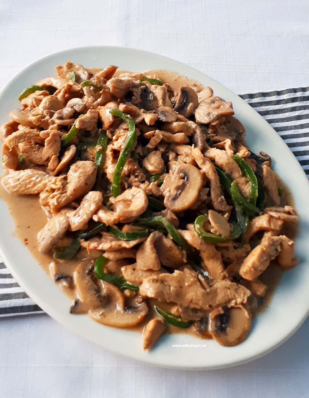 A Rum based marinade turns this Drunken Chicken Stir-Fry into a tender, juicy dish, best served over pasta. This is the perfect quick and easy dinner recipe !